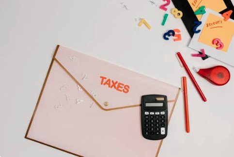Taxes document folder with a calculator